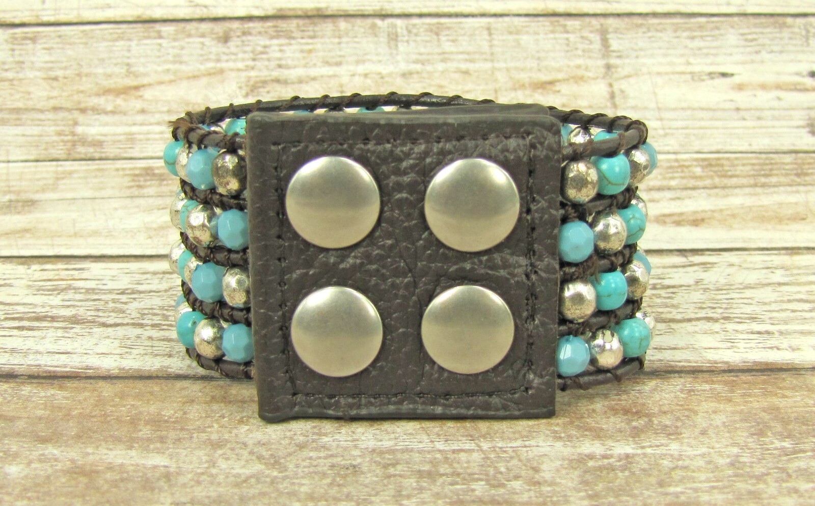 Wide turquoise and silver beaded leather bracelet , snap closure, brown leather