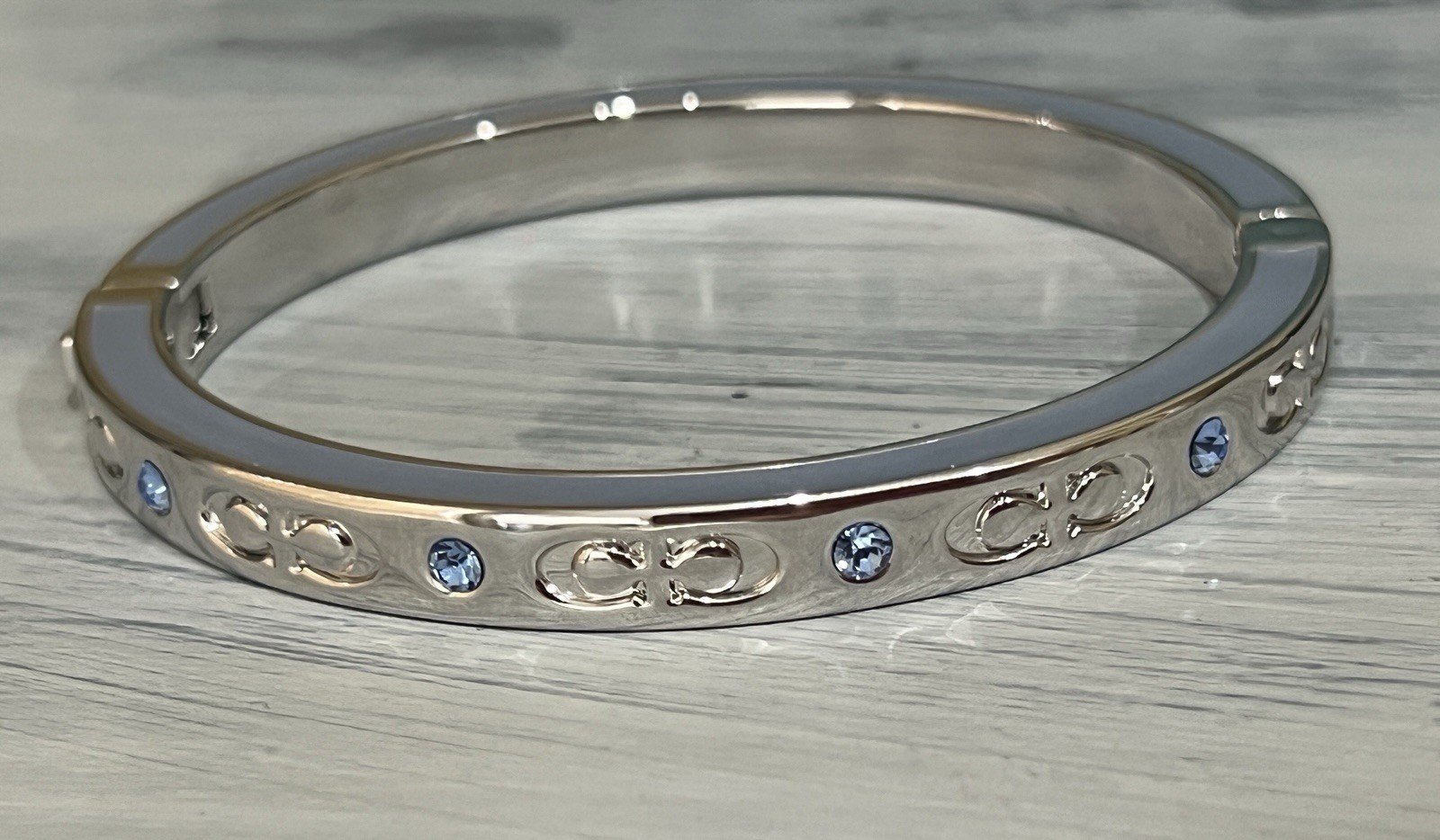 Coach Kissing C Hinged Bangle Bracelet Silver with Pool Crystal Accents – F59083