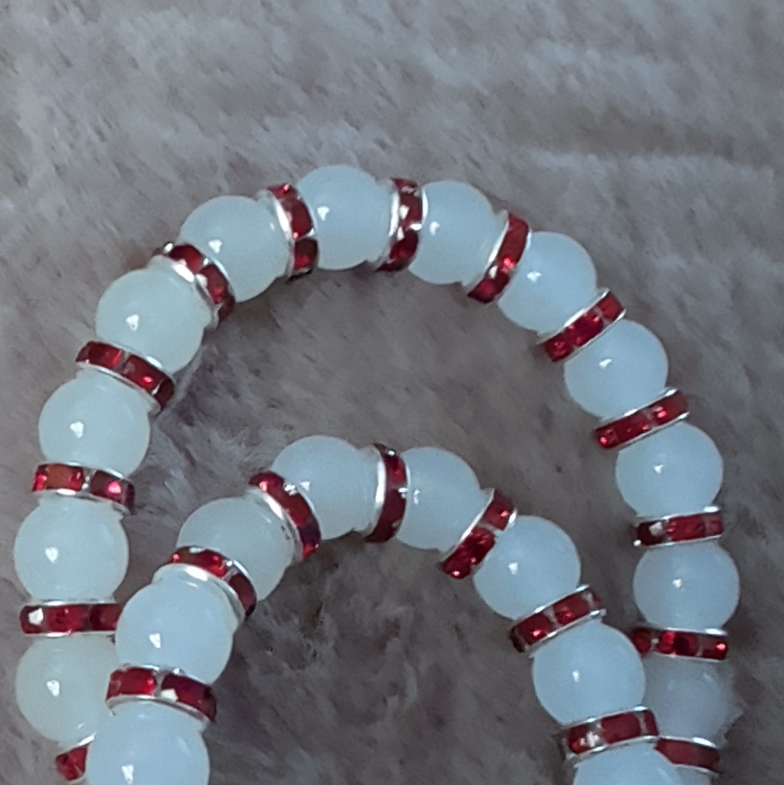 Set of 2 White Beaded Stretch Stackable Bracelets w/ Red Spacer Rings