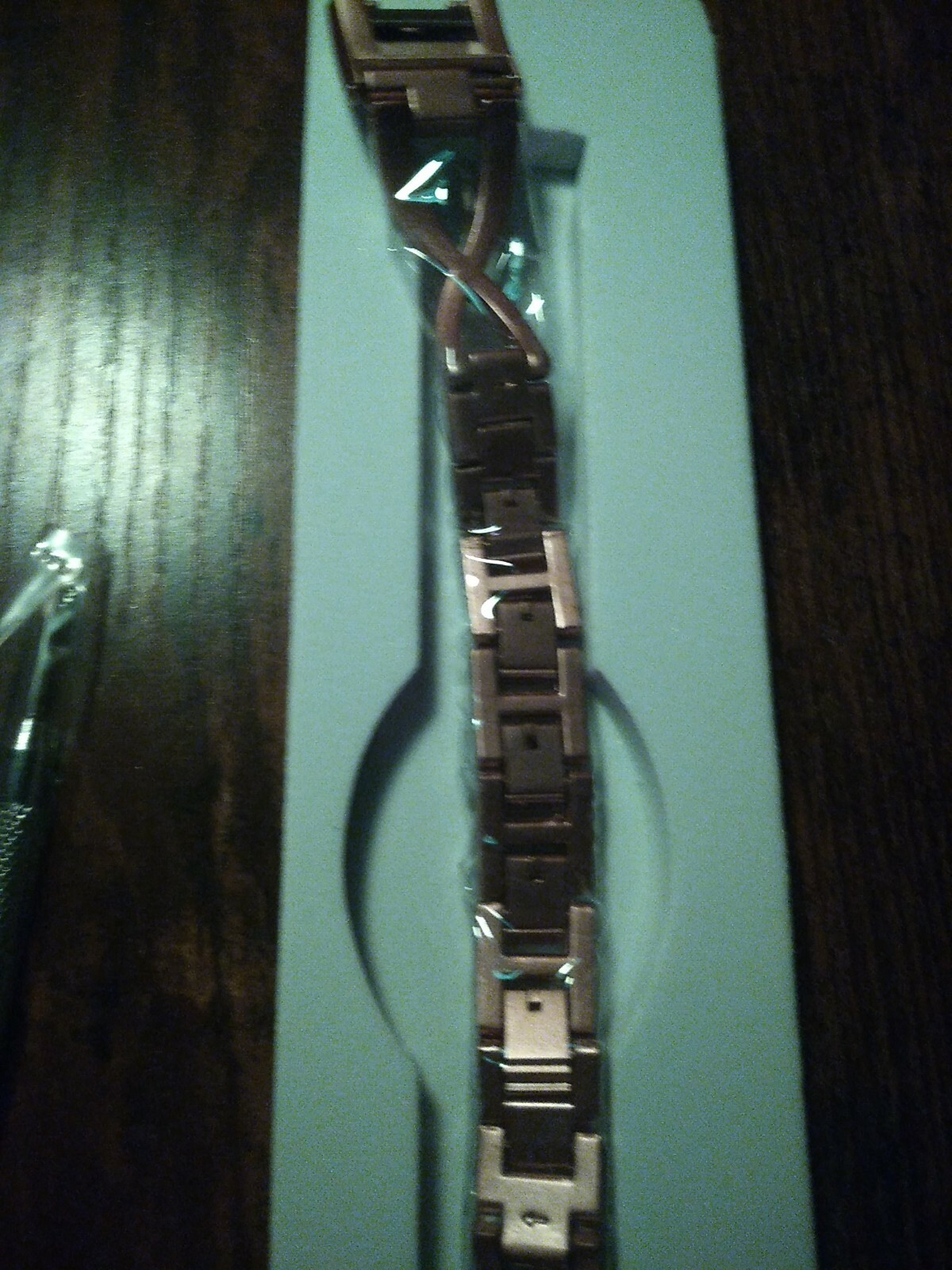 Pink metal smartwatch band. Not sure which one it’s for though.
