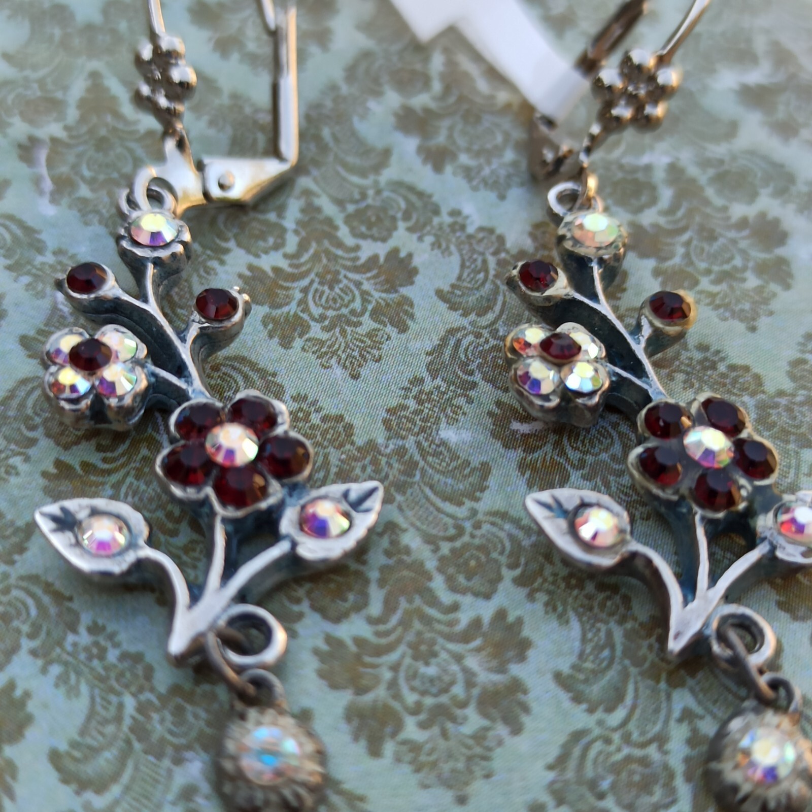 Michal Negrin Earrings Silver Aurora Borealis Red Crystals Long Flower Branch