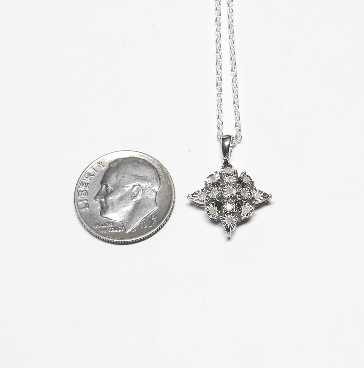 Sterling Silver .10ct TW Natural Diamond Pendant w/18″ Sterling Cable Chain