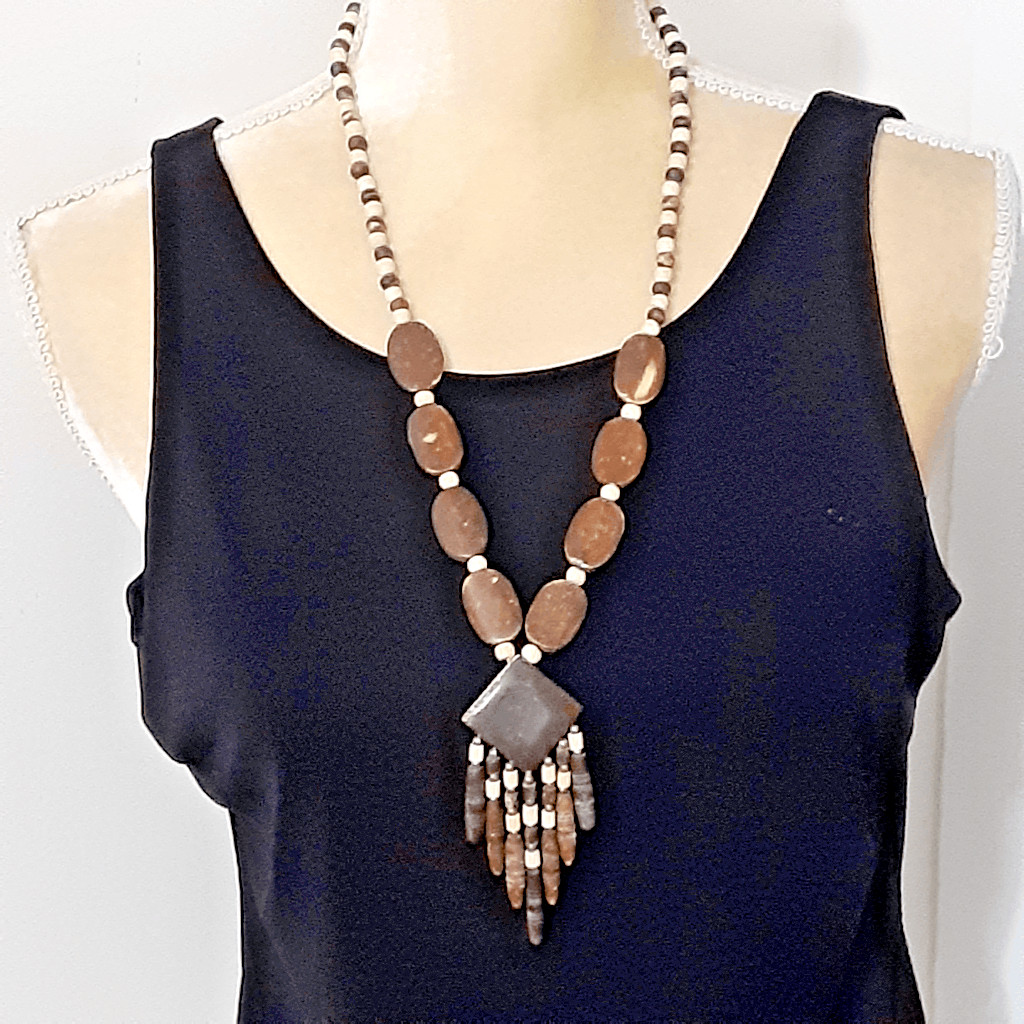 Tribal wooden beaded necklace 32″ brown cream tones