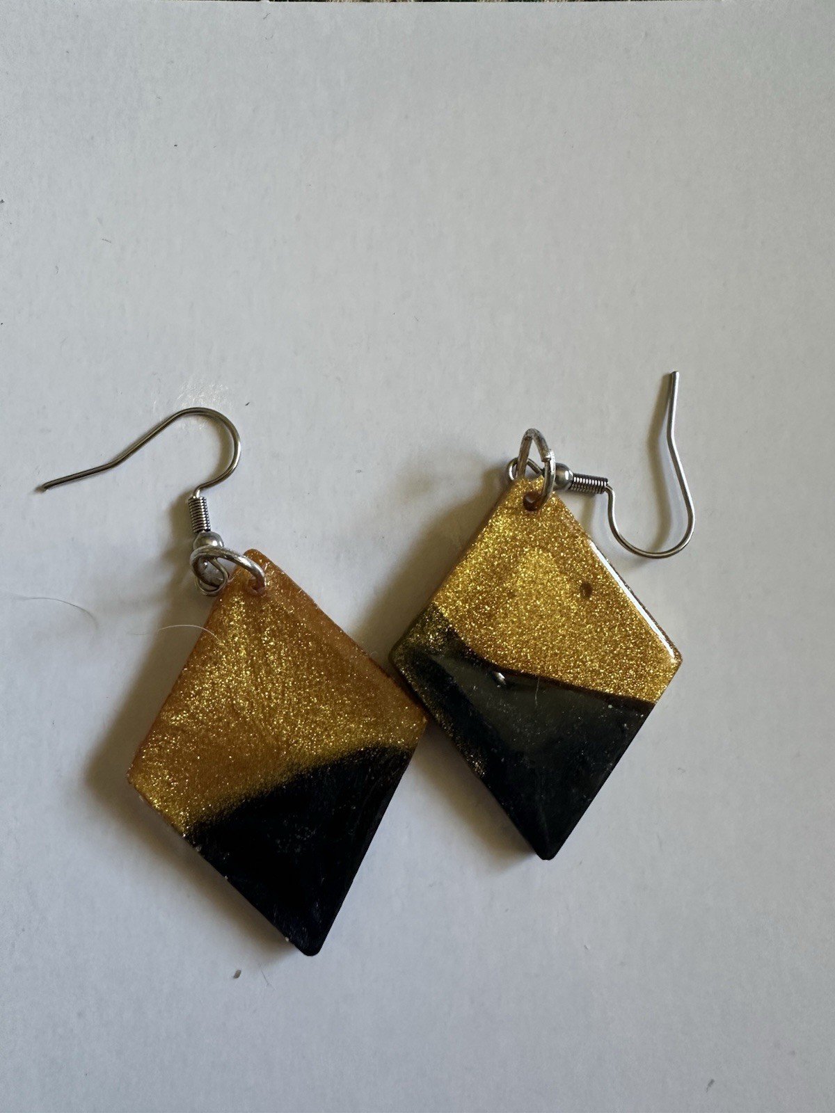 8 pair ofResin Earrings. 15.00