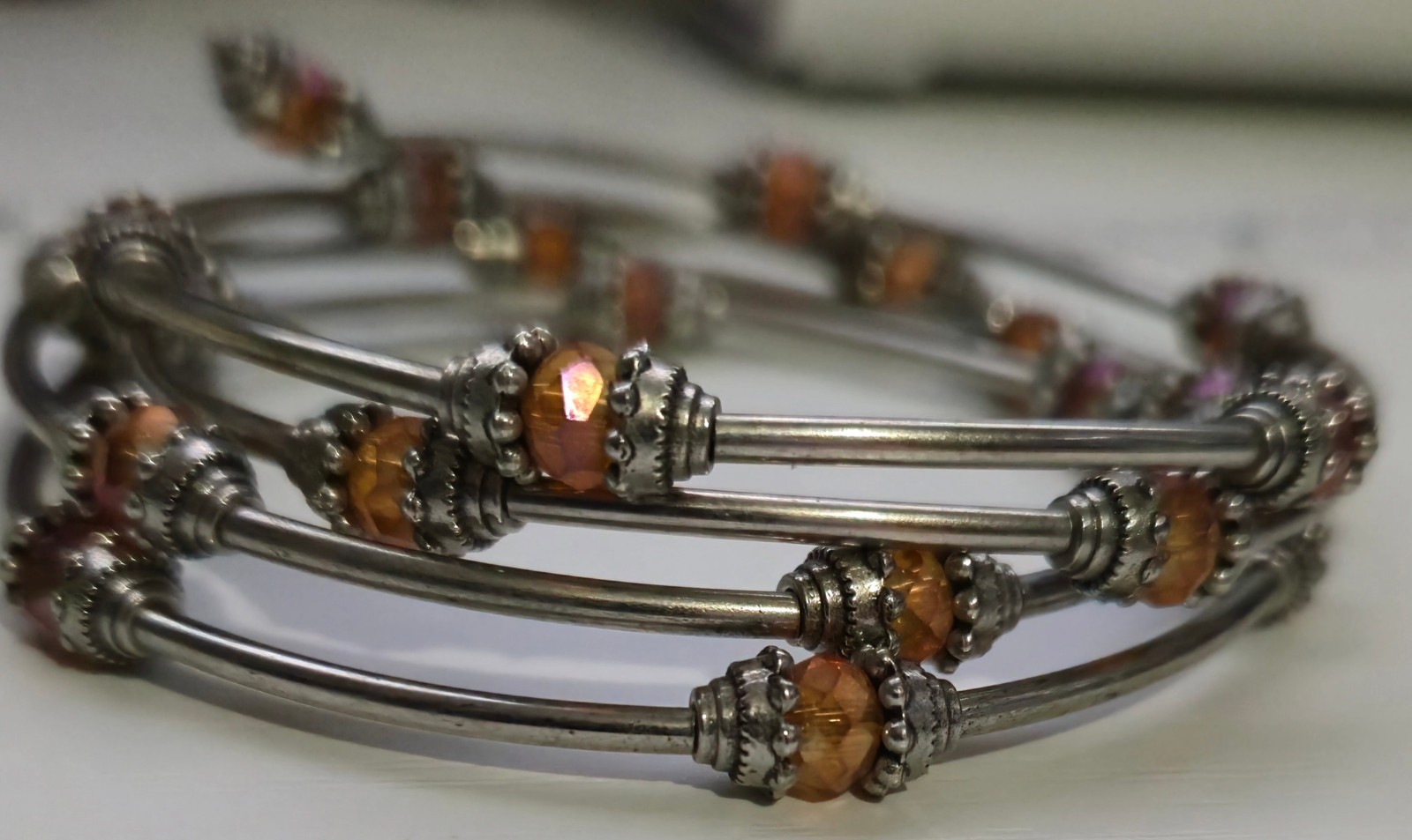 Set of 2 Silver Memory Wire Wrap Bracelets Amber Orange Iridescent Glass Beads