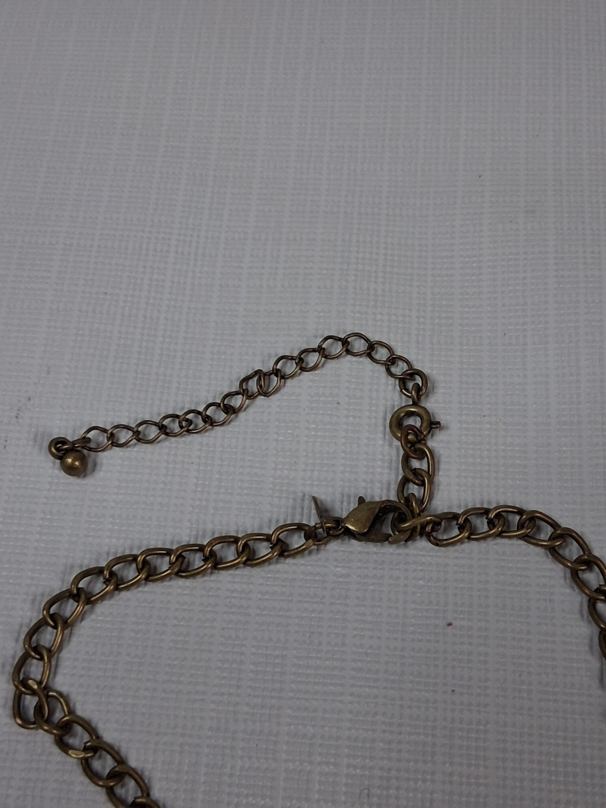 Avon Gold and Silver Toned Assorted Multi Strand Chain Charm Statement Necklace