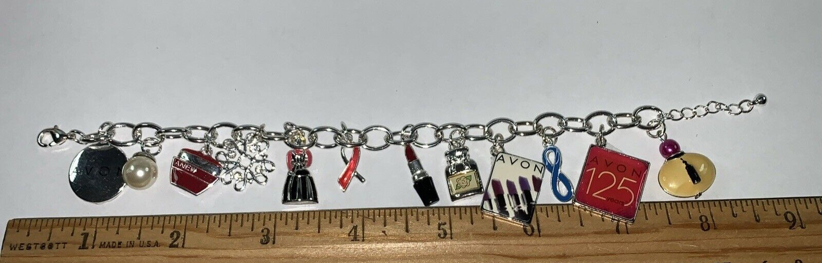 Avon 125th Anniversary Silver Tone Charm Bracelet NIB