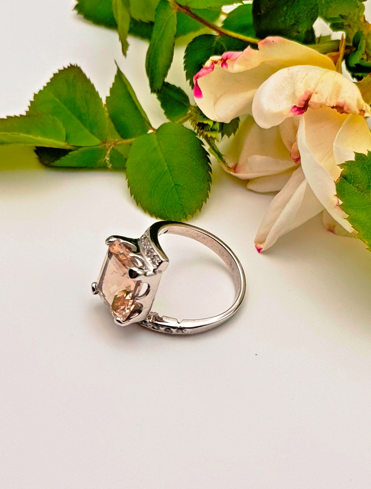 Emerald cut topaz paired with sparkling zircon, set in handcrafted 925