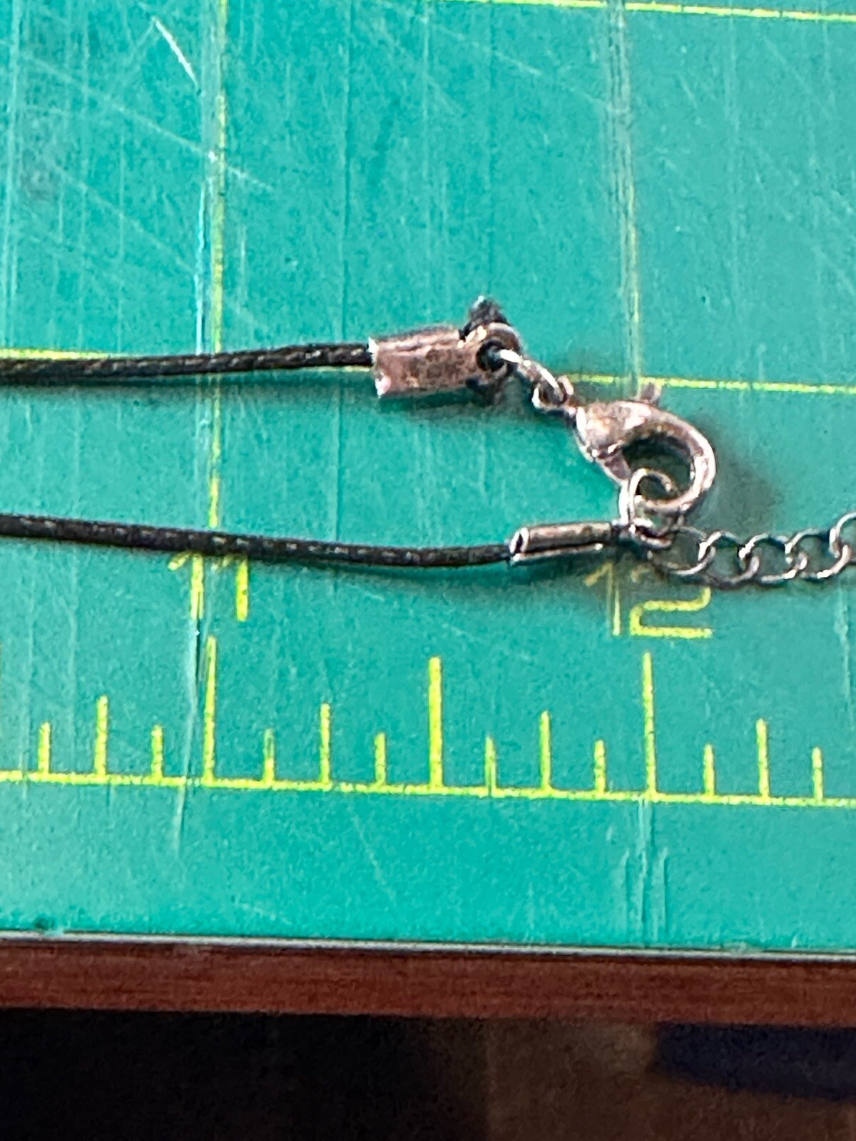 Six Segment Worry Fish Pendant On 24” Nylon Necklace With Lobster Clasp