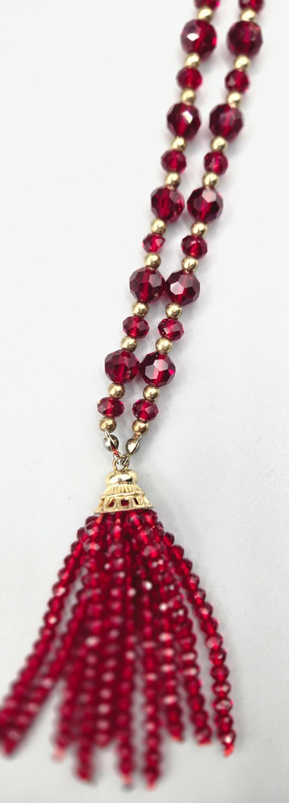 Charming Charlie Long Gold Tone Red Faceted Glass Bead Tassel Necklace 36 in