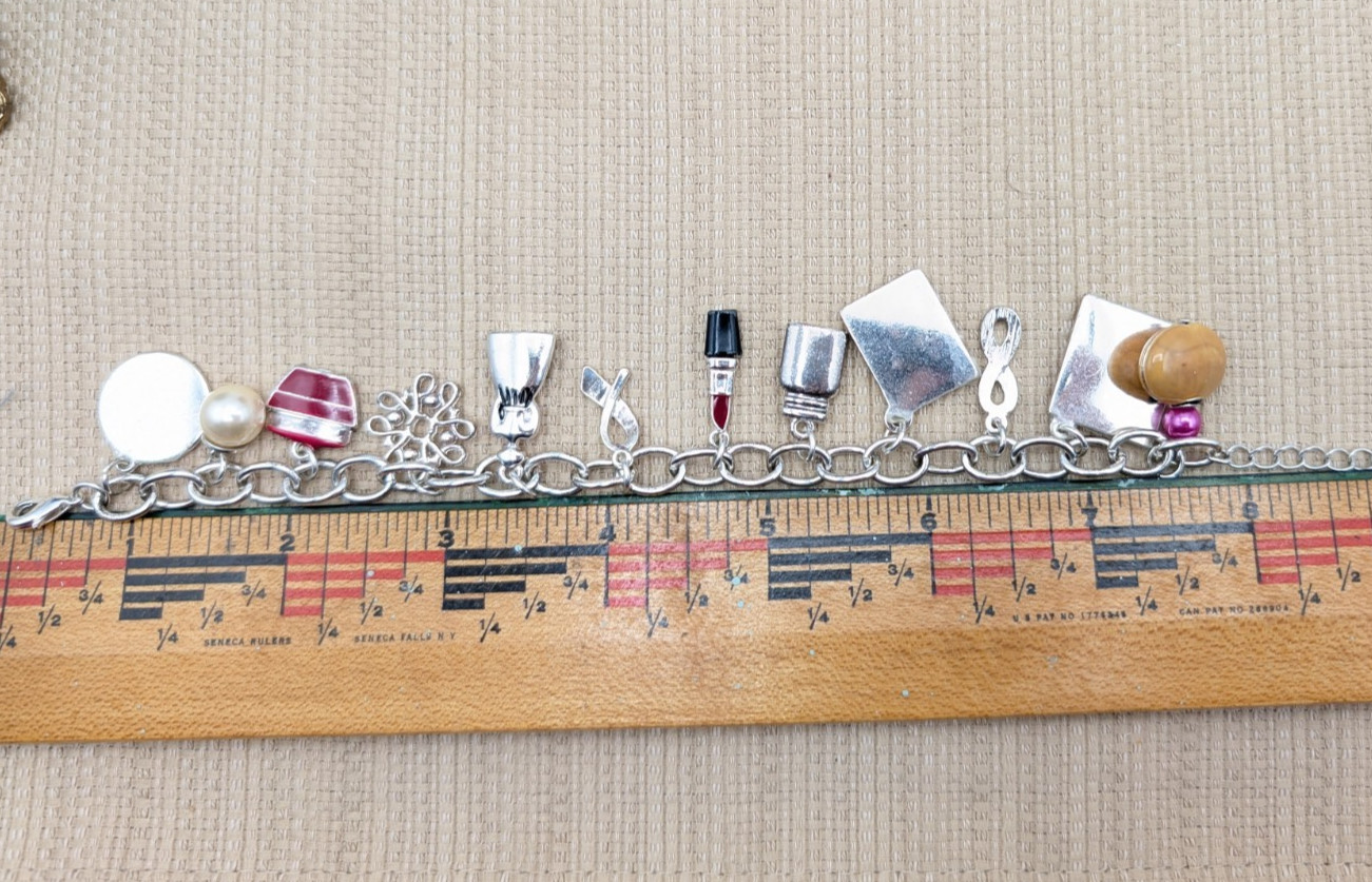 2 Avon Representative Charm Bracelet-125th Anniversary & David H McConnell Award