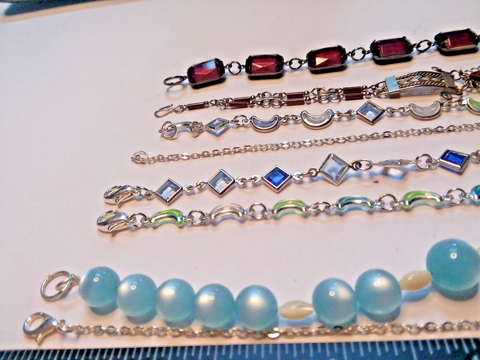8 Bracelets: 3 Bracelets are Metal, 5 are Plastic 05-01-2026