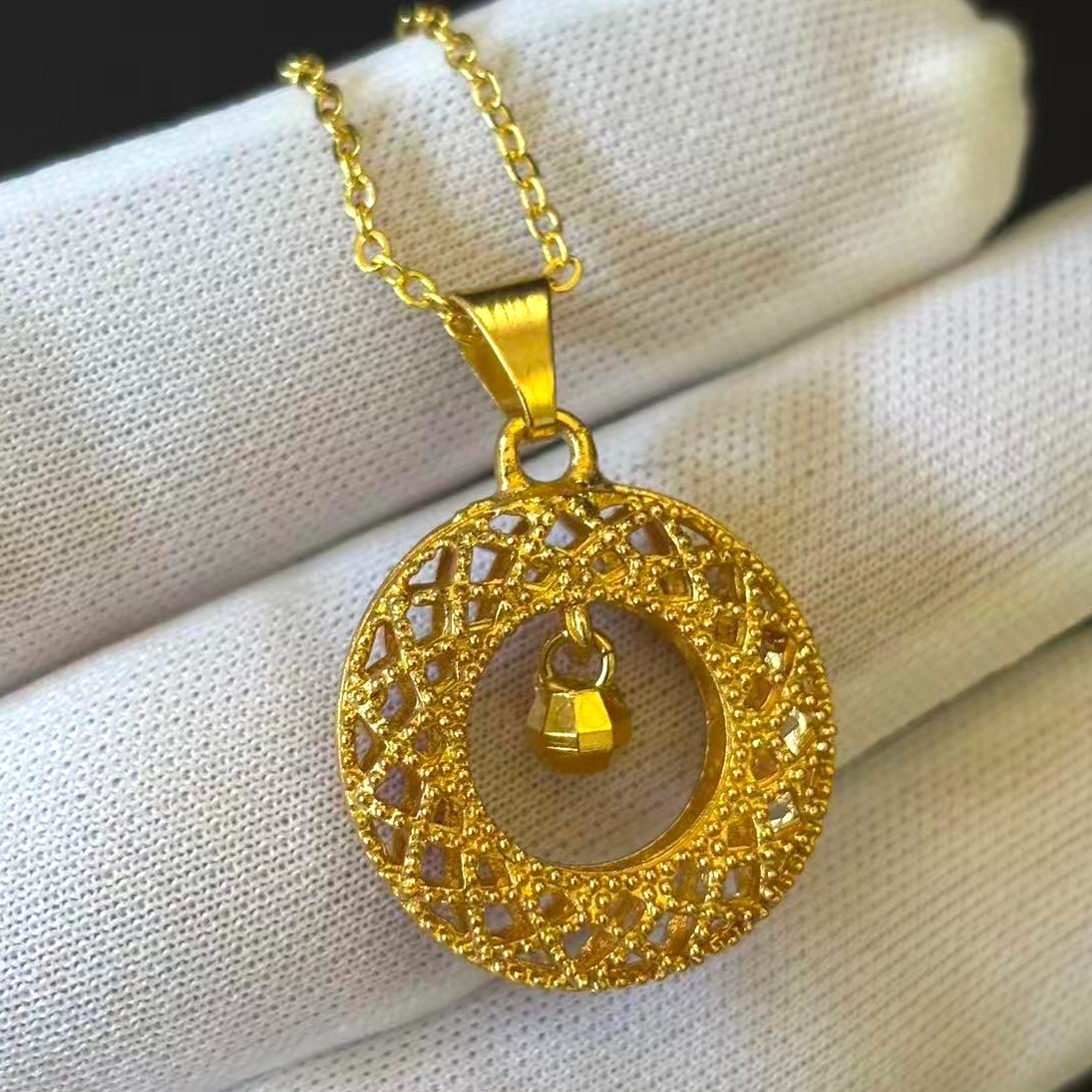 Hollowed-out Gold-plated?(NOT SURE) Gold tone Round Pendant Necklace marked’999′
