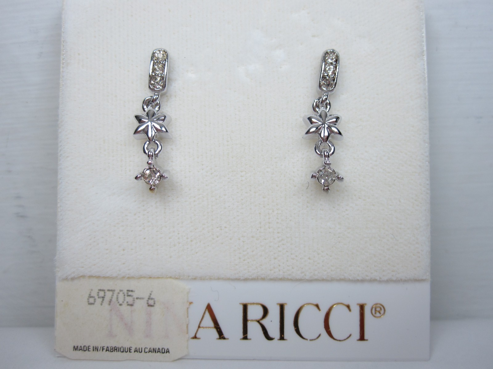 Nina Ricci Rhodium Plated Pierced Earrings with Swarovski Crystals – 8379