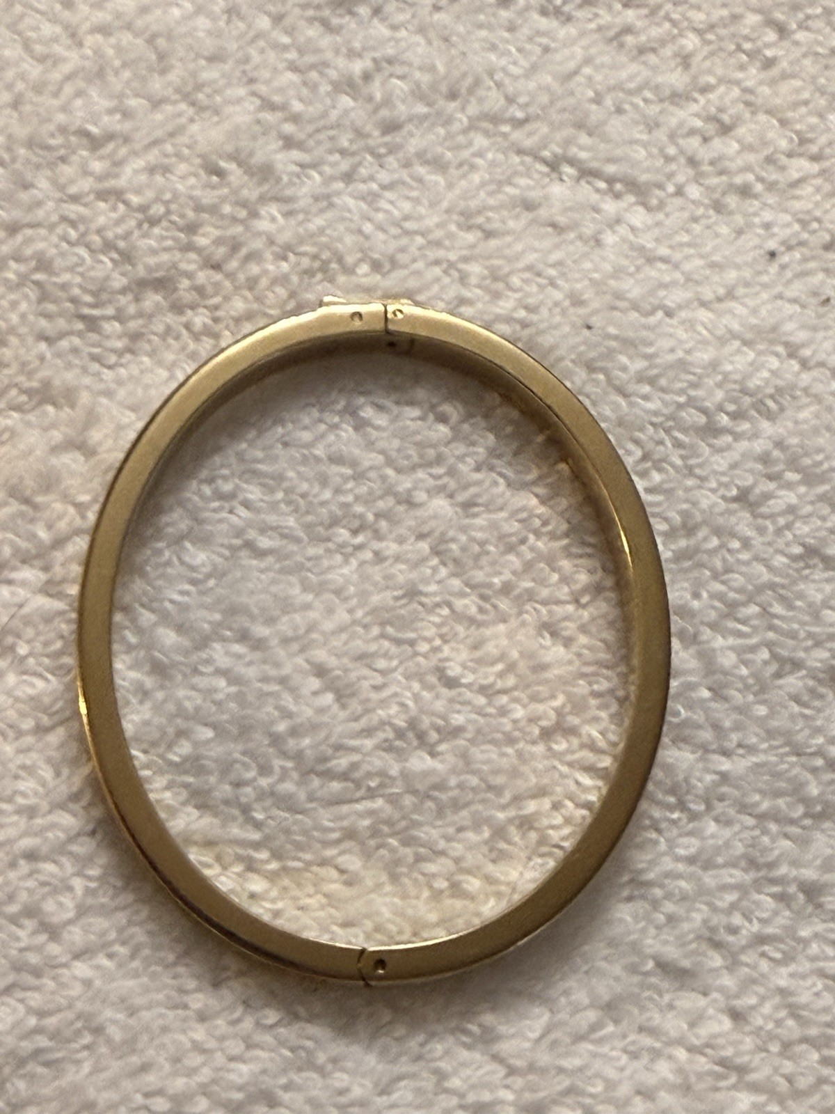 Fossil Brand Gold tone latch closure bangle with white stones