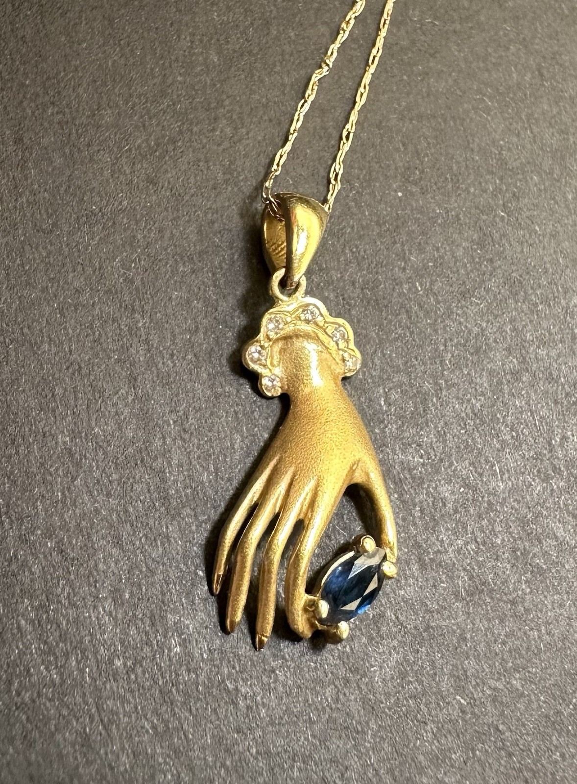 Vintage 18k Gold Hand Charm Pendant Necklace Marquise cut Sapphire and Diamonds