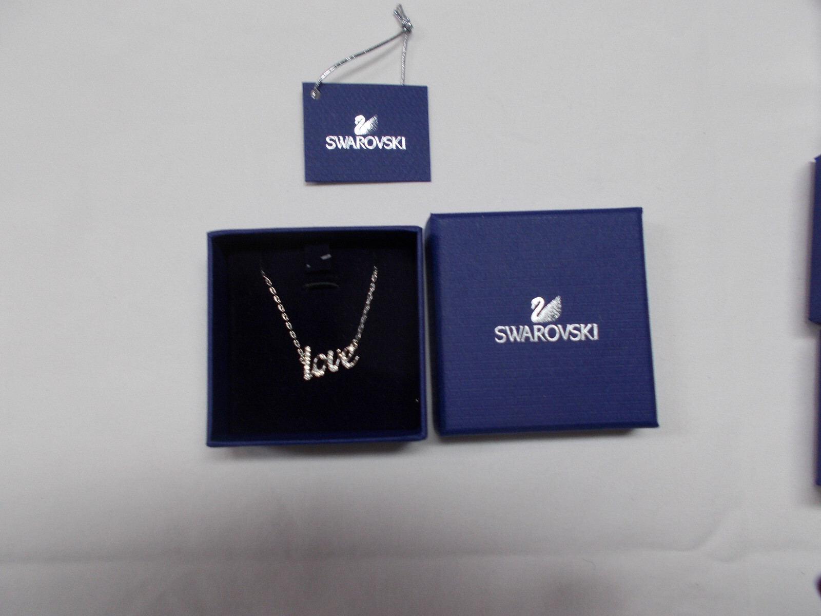 Swarovski Emotion:Bracelet Love & necklace w/swan charm & lobster hook