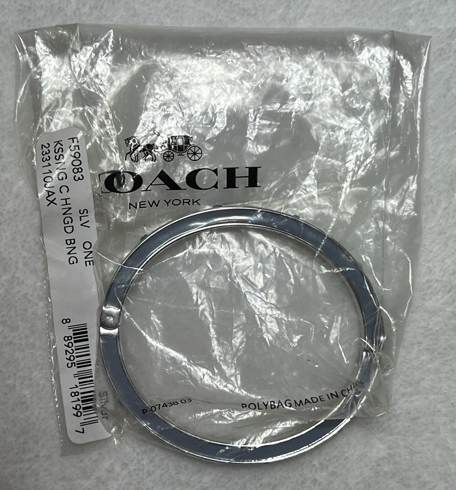 Coach Kissing C Hinged Bangle Bracelet Silver with Pool Crystal Accents – F59083