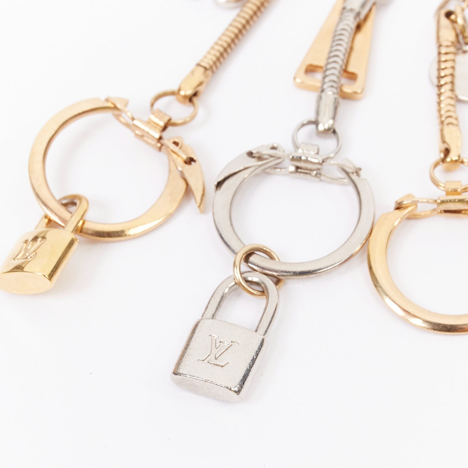 LOUIS VUITTON palladium gold plated safety pin keyring LV lock heart charms