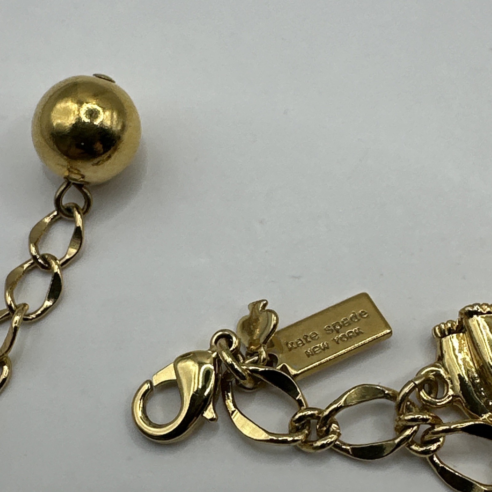 Adorable Kate Spade Charm Bracelet with Bows Gold Tone 7-8.5”