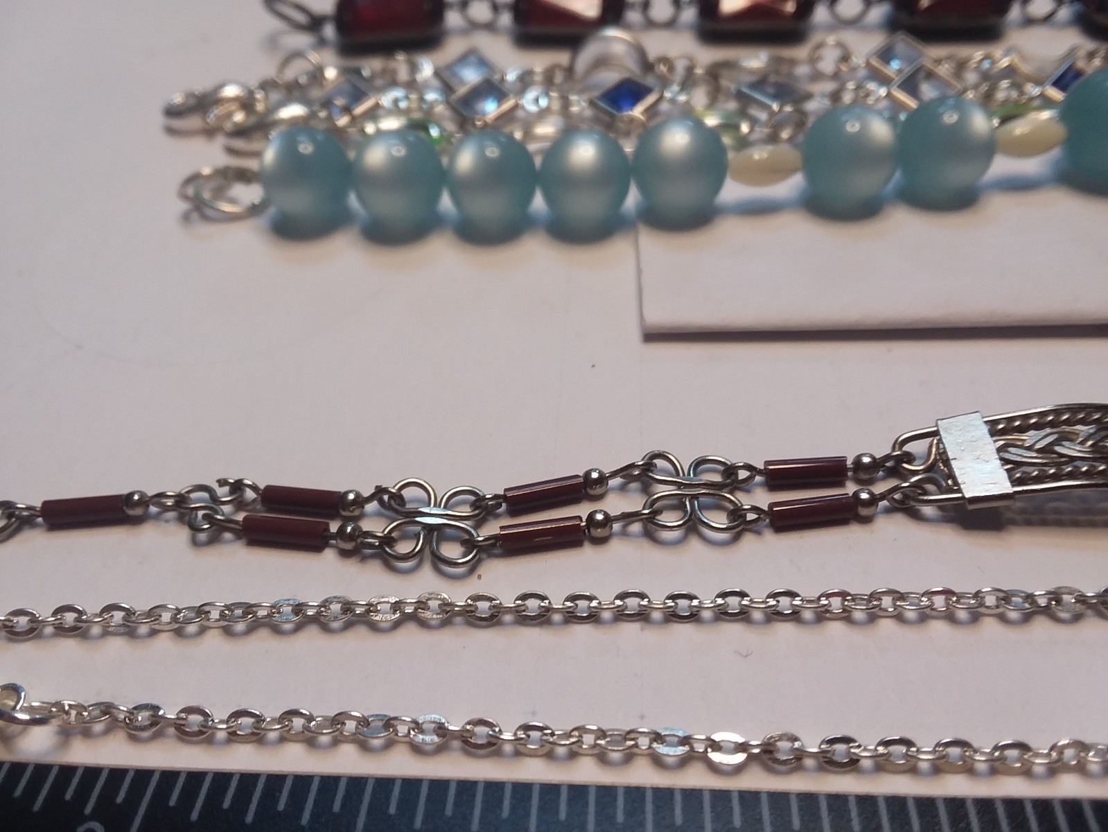 8 Bracelets: 3 Bracelets are Metal, 5 are Plastic 05-01-2026