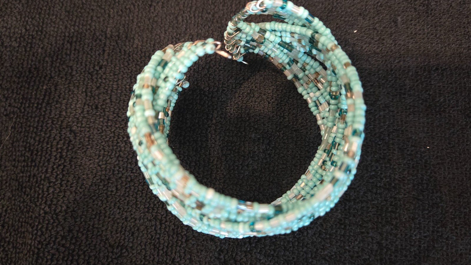 Sky Aqua beaded stretchable, good condition