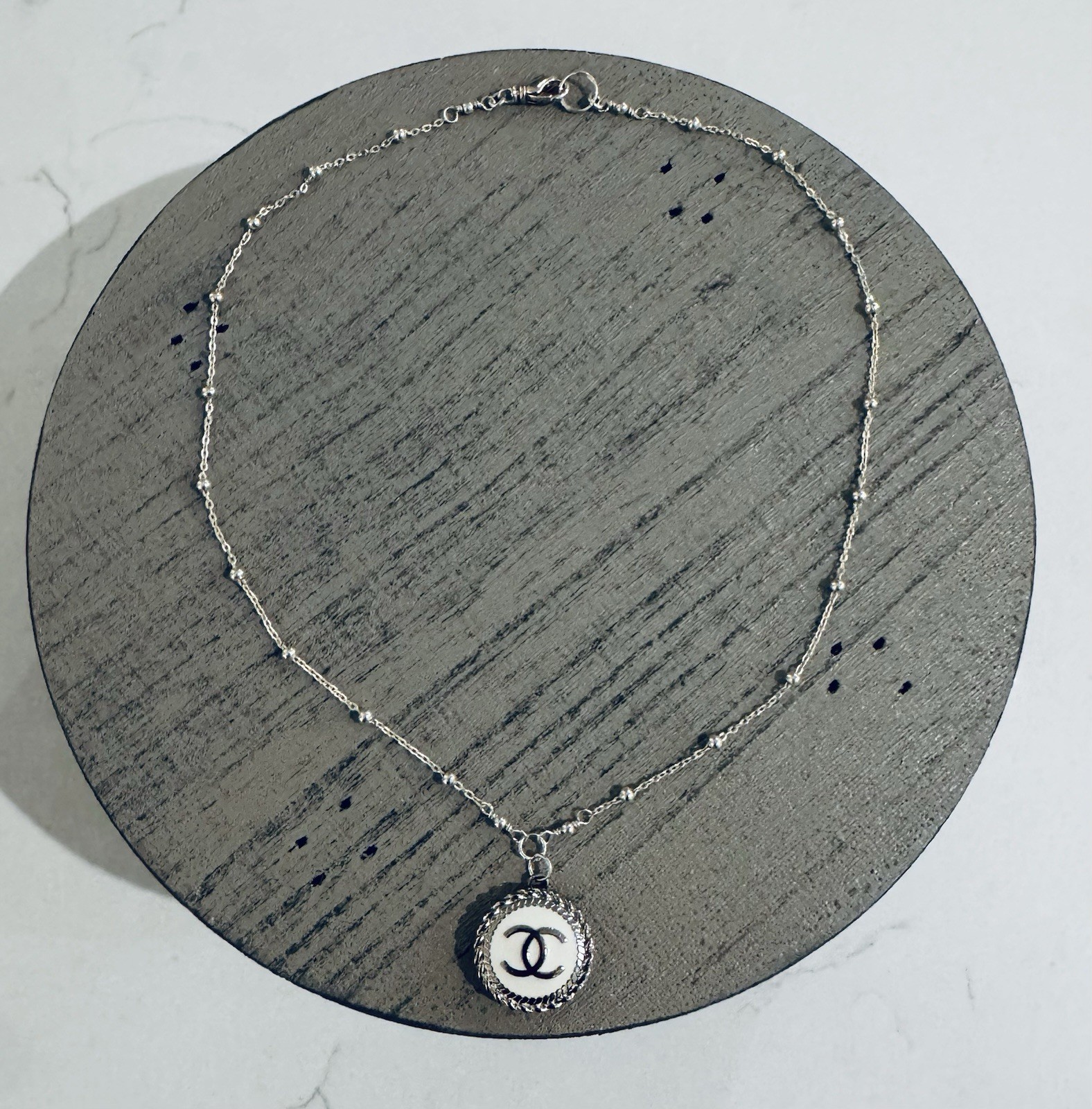 Chanel 3/4” White Enamel & Silver Pendant on 18” Silver Station Necklace. UEC!