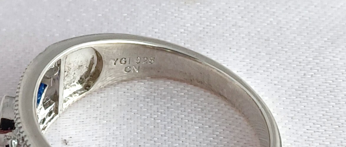 YGI Designer Sterling Cubic Zerconia w/ blue Accent Stone Ring/ Band Size 9