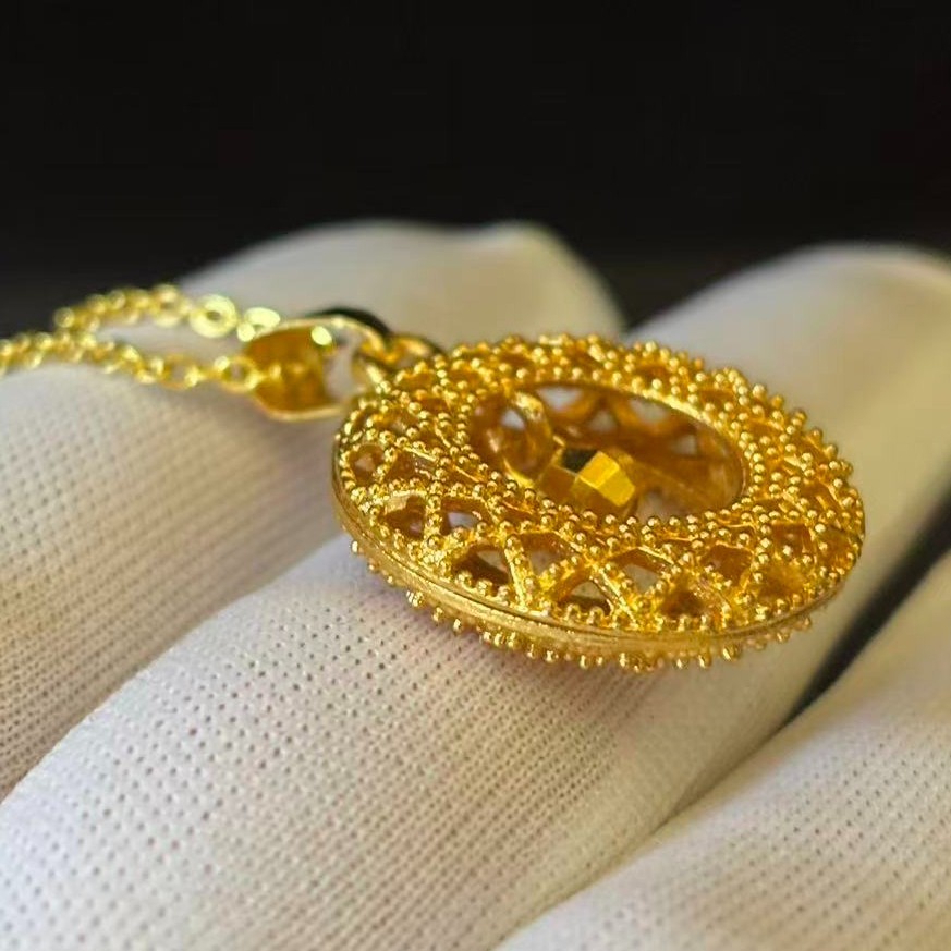 Hollowed-out Gold-plated?(NOT SURE) Gold tone Round Pendant Necklace marked’999′