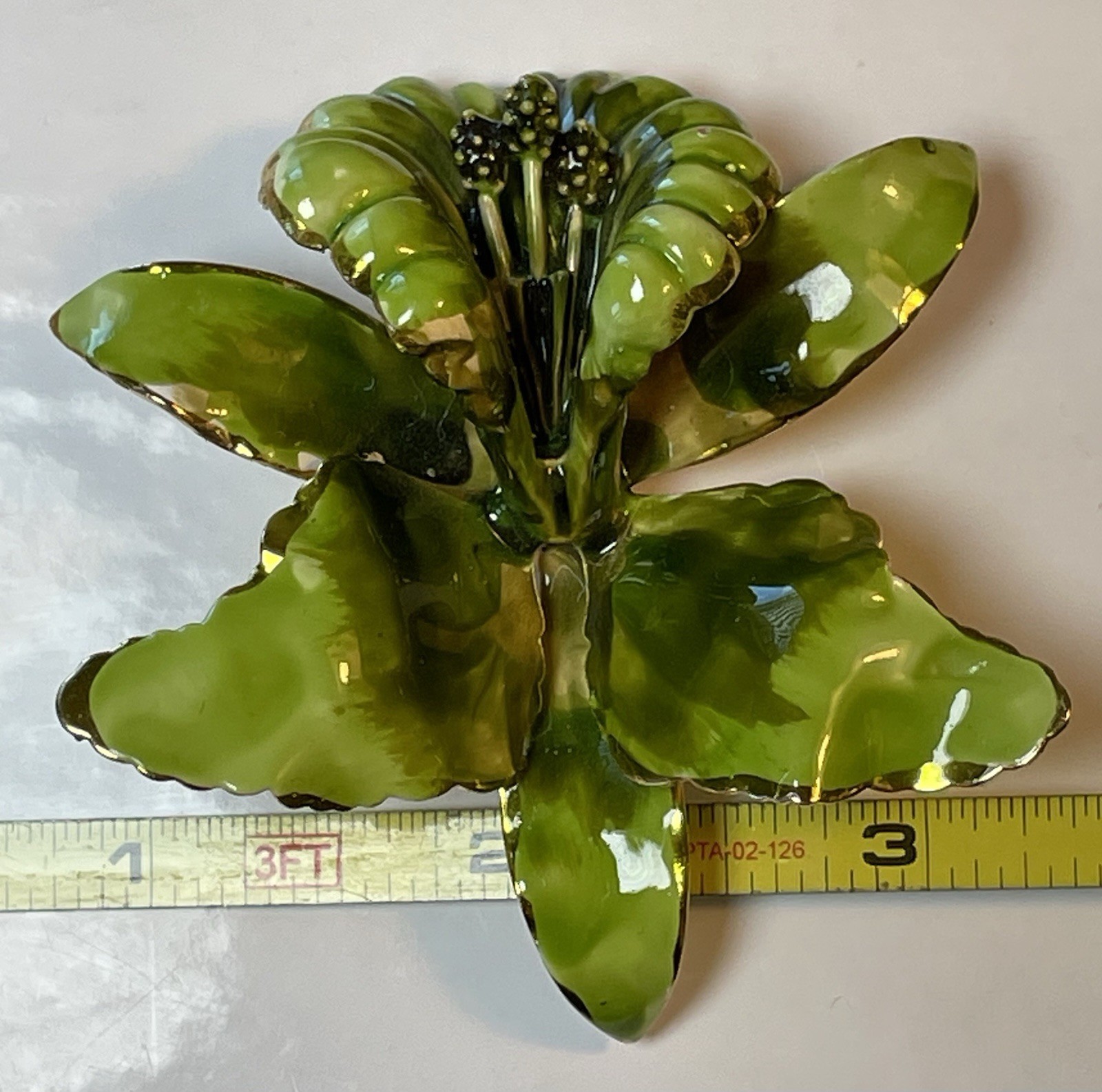 Green Enamel Lily Flower Brooch Gold Rimmed and Gold Tone Metal Pin Closure