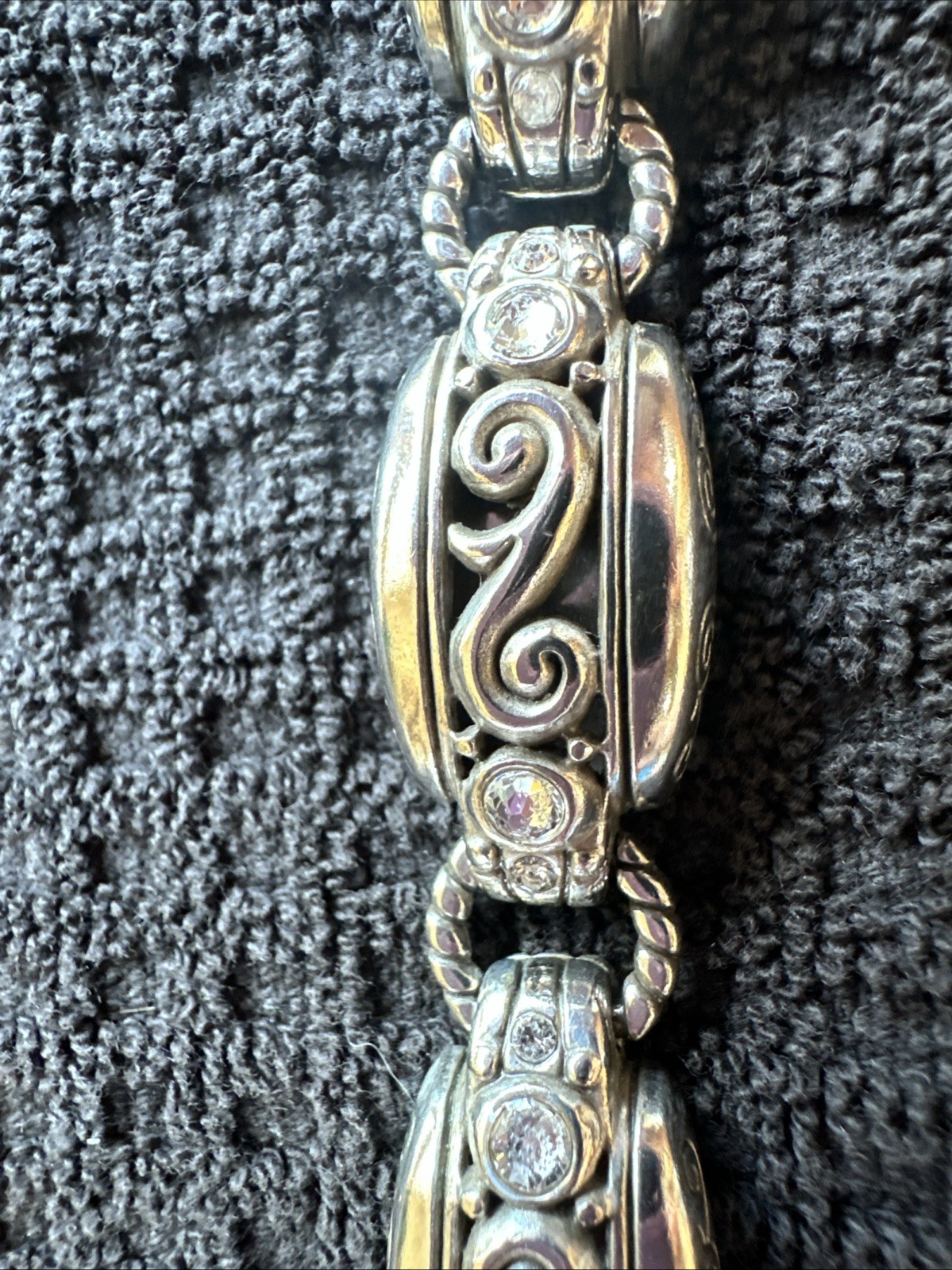 Brighton silver scroll link bracelet, ornate swirl designs and clear crystals.