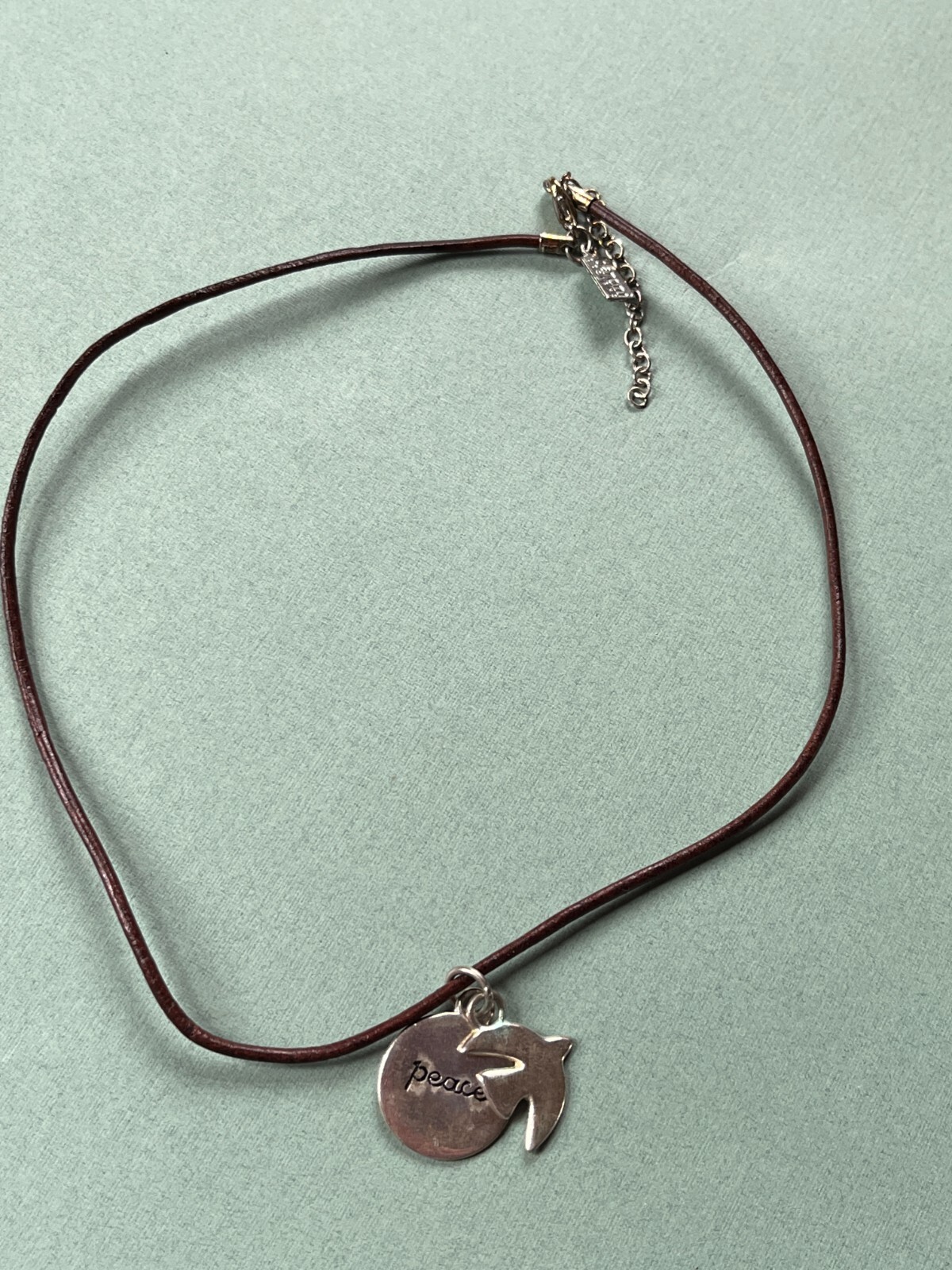 Baroni Designs Signed Brown Leather Cord w Silvertone Peace Disk & Dove Pendant
