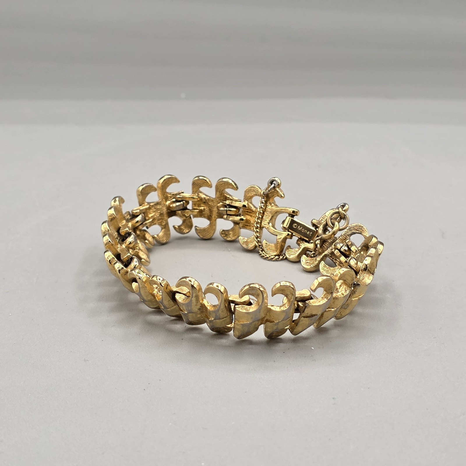 Vintage Monet Gold Tone Textured Link Panel Bracelet Fold Over Clasp