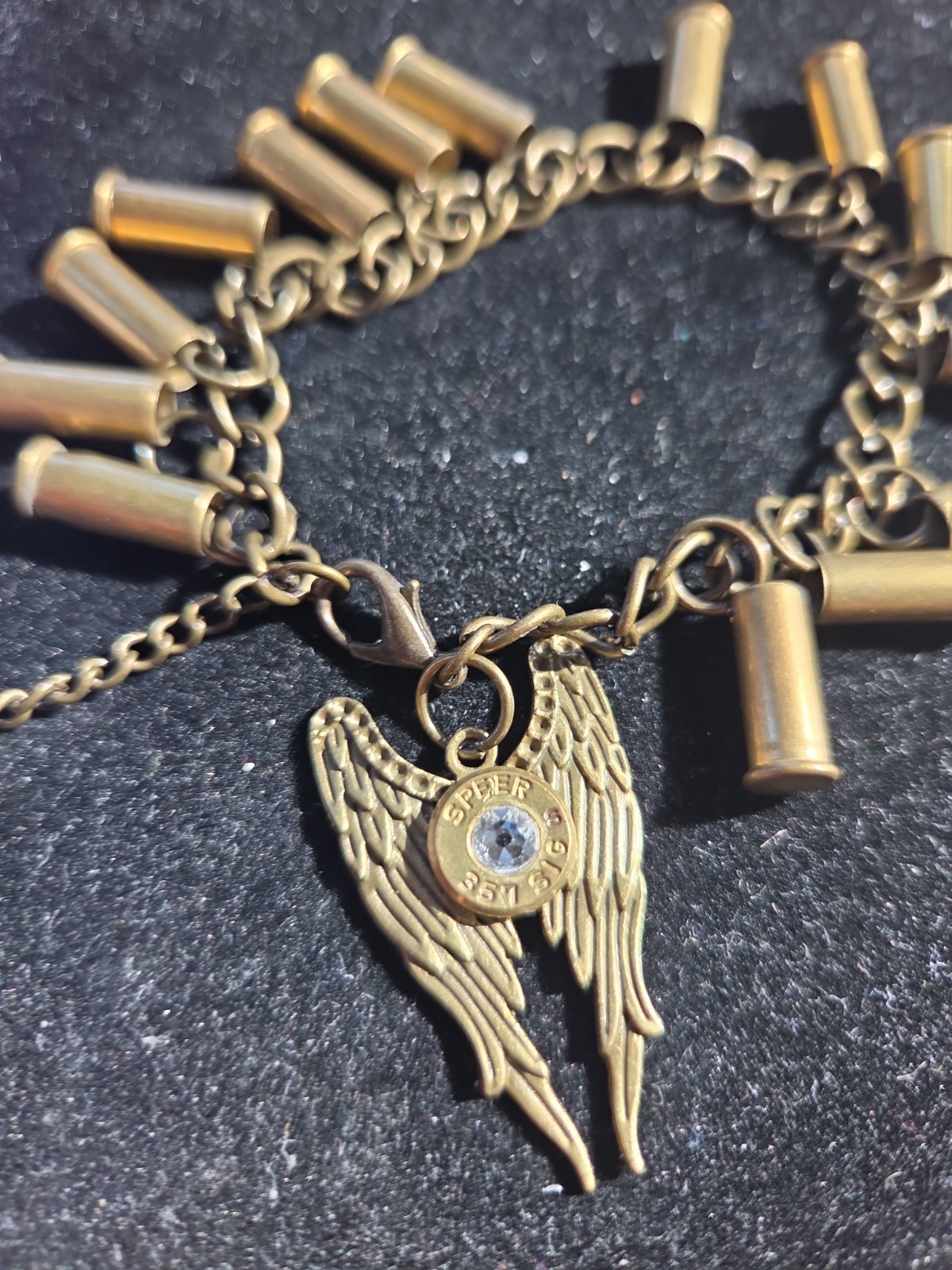 Bullet casing. Bracelet ricelet brass with angel wings
