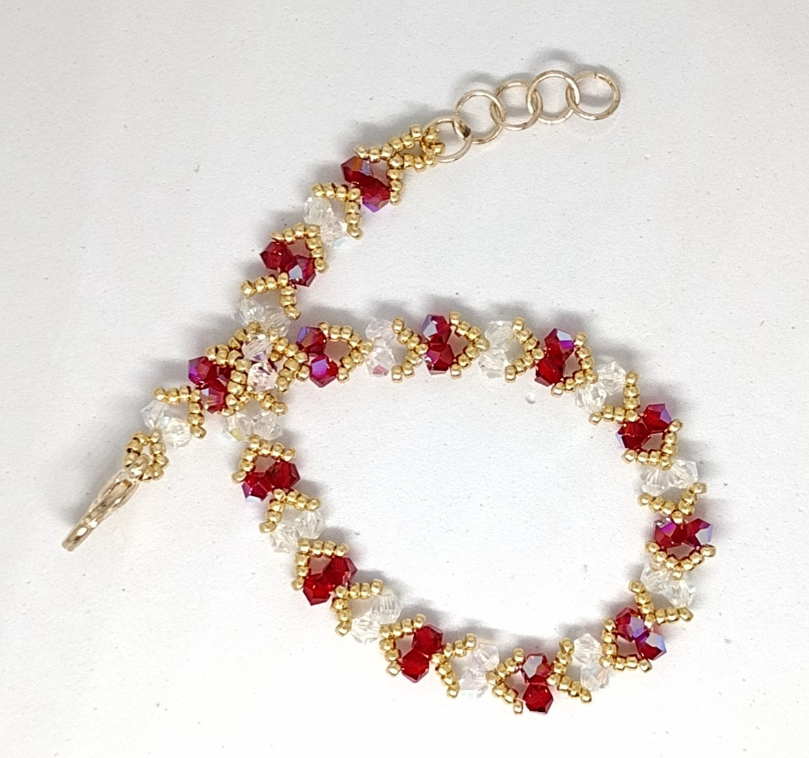 6-inch Bracelet 4mm Crystal Red/White Sparkly Bicone Beads/Gold Miyuki Beads.