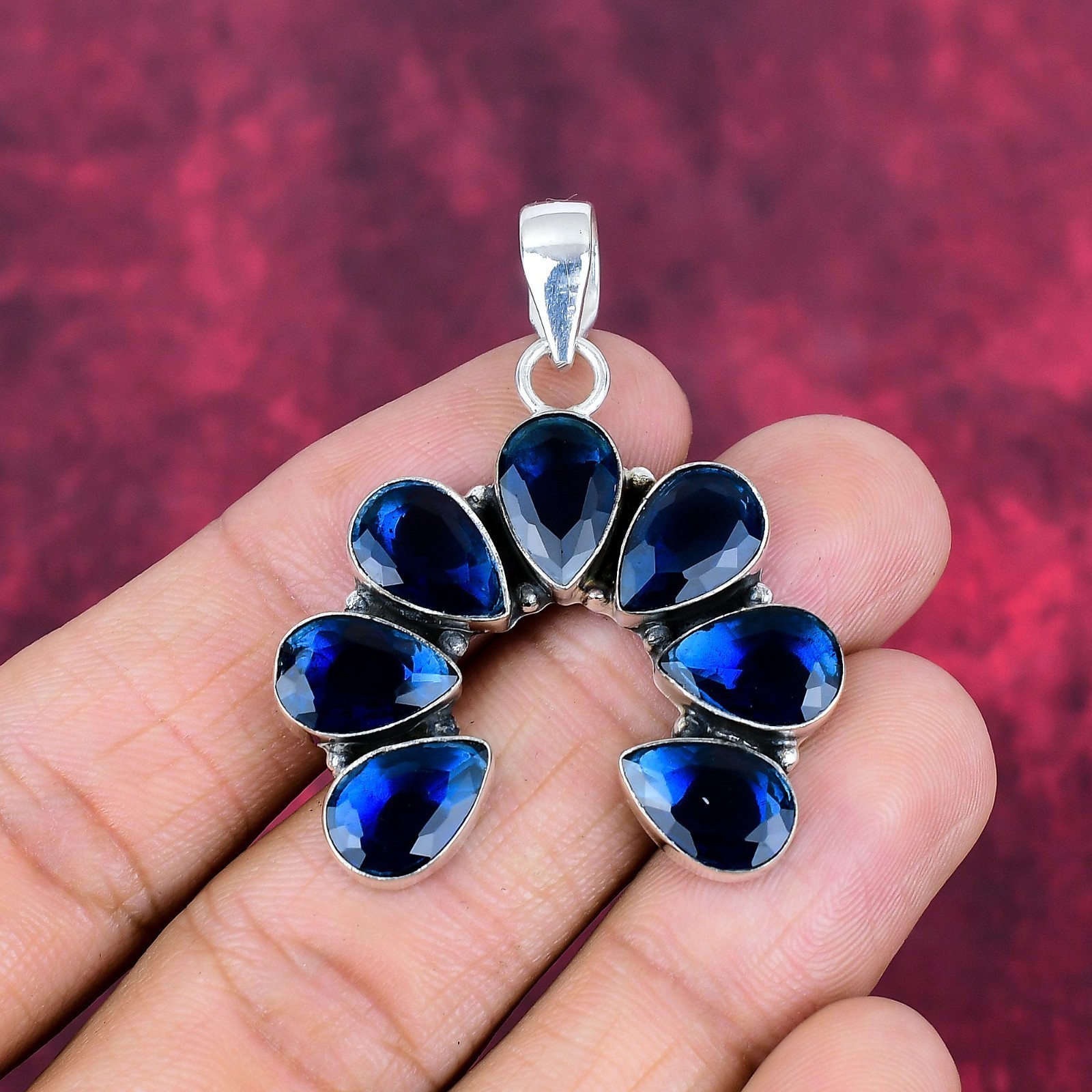 Pear Cut Simulated Blue Sapphire Women’s Charm Pendant In 14K White Gold Plated