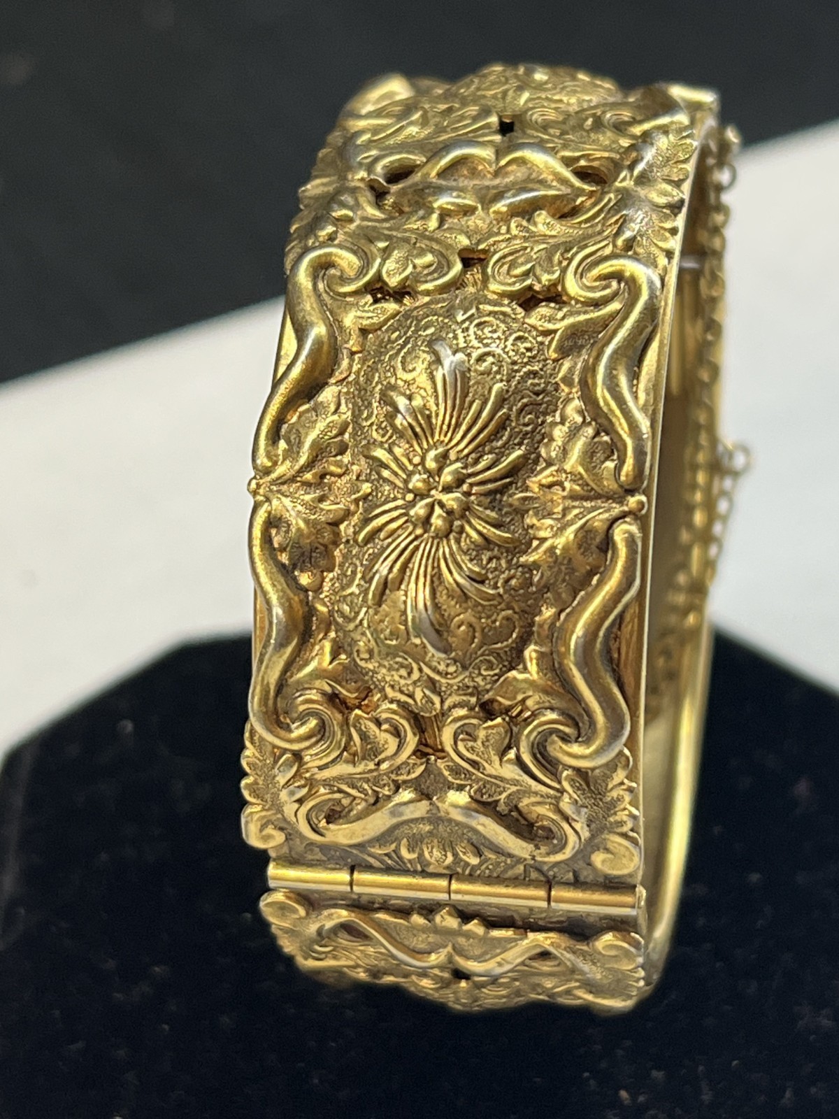 Lisner Gold Tone Ornate Carved Cuff Hinged Bracelet Floral Safety Chain Large