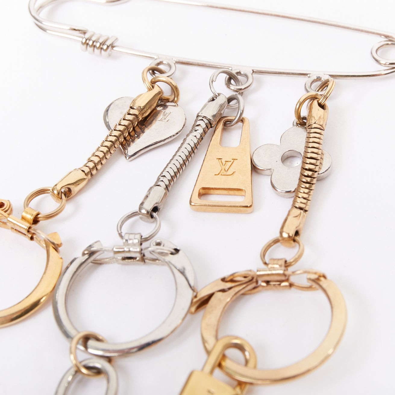 LOUIS VUITTON palladium gold plated safety pin keyring LV lock heart charms
