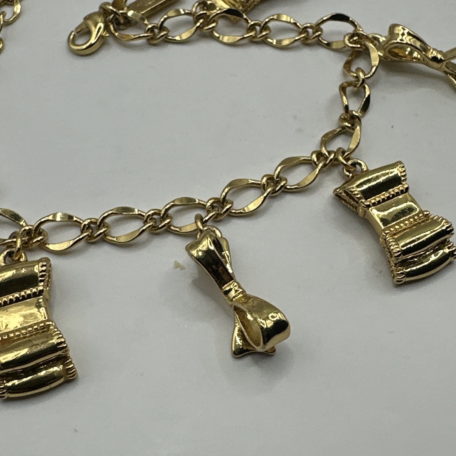 Adorable Kate Spade Charm Bracelet with Bows Gold Tone 7-8.5”