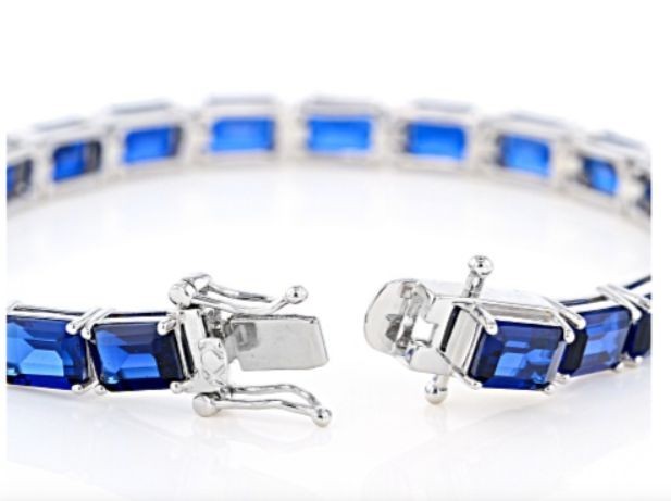 Blue Lab Created Spinel Rhodium / Sterling Silver 7.25″ tennis Bracelet 23.92ctw