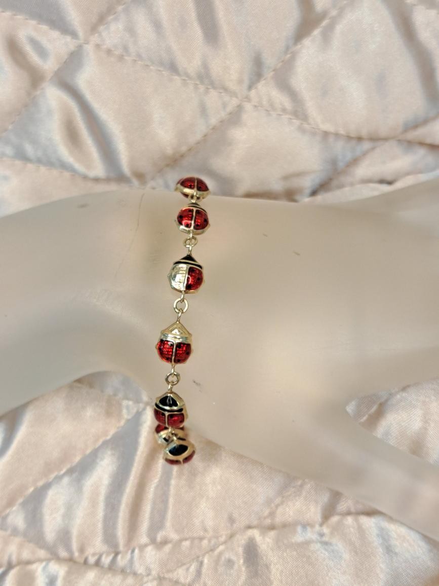 LADYBUG LINK 10K YELLOW GOLD BRACELET: 2.1DWT GOLD WITH RED AND BLAC (TC4036816)