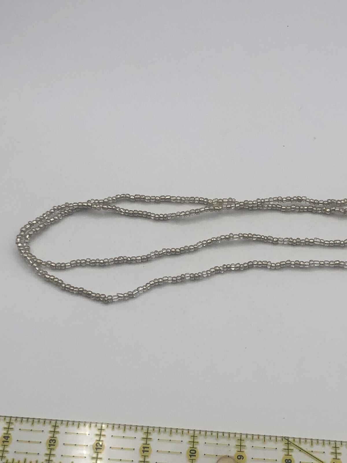 Beaded Infinity Necklace 27” Silver Clear Reflective to Clothing Color
