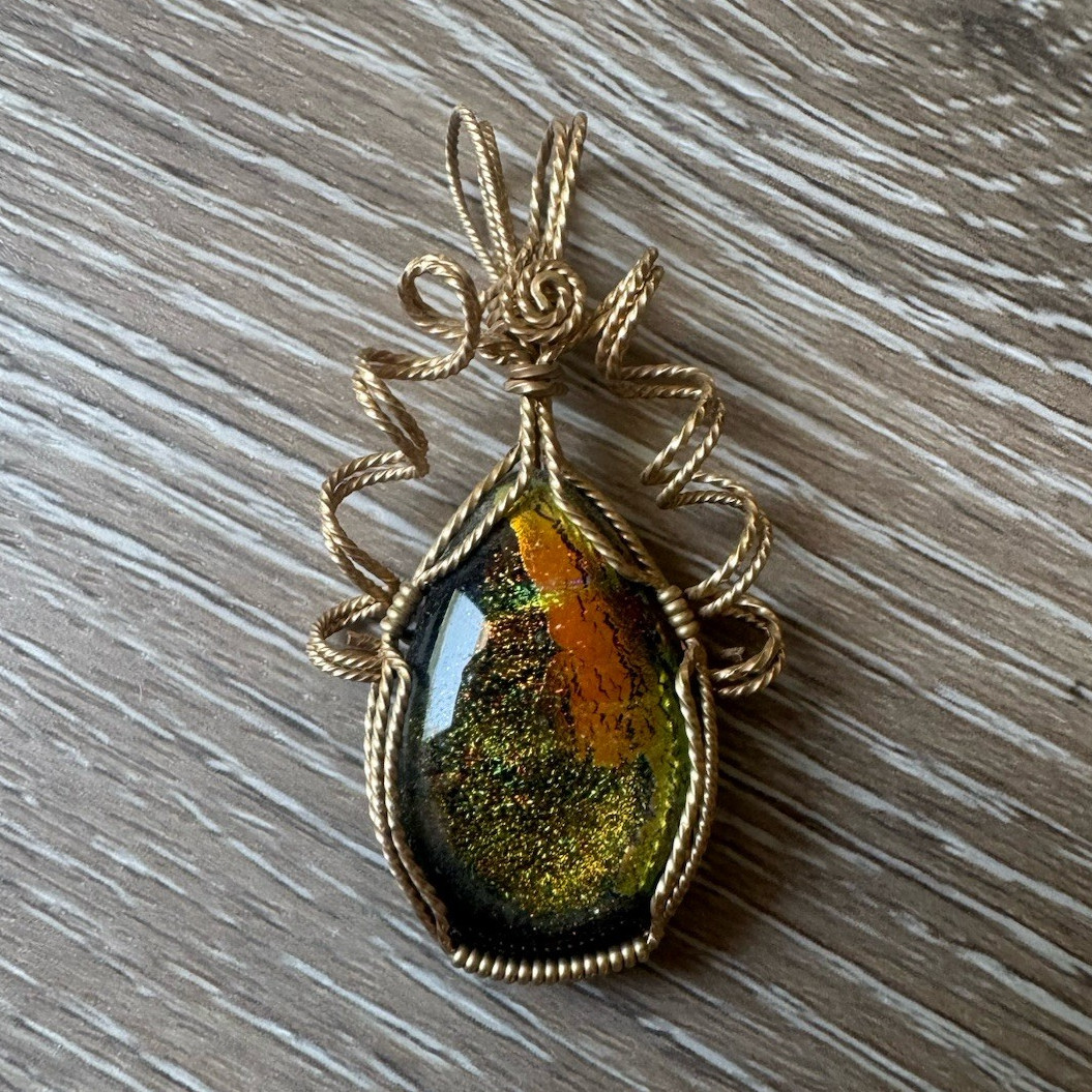 Wire Wrapped Oval dichroic glass pendant Handcrafted Charm w/ gold tone details