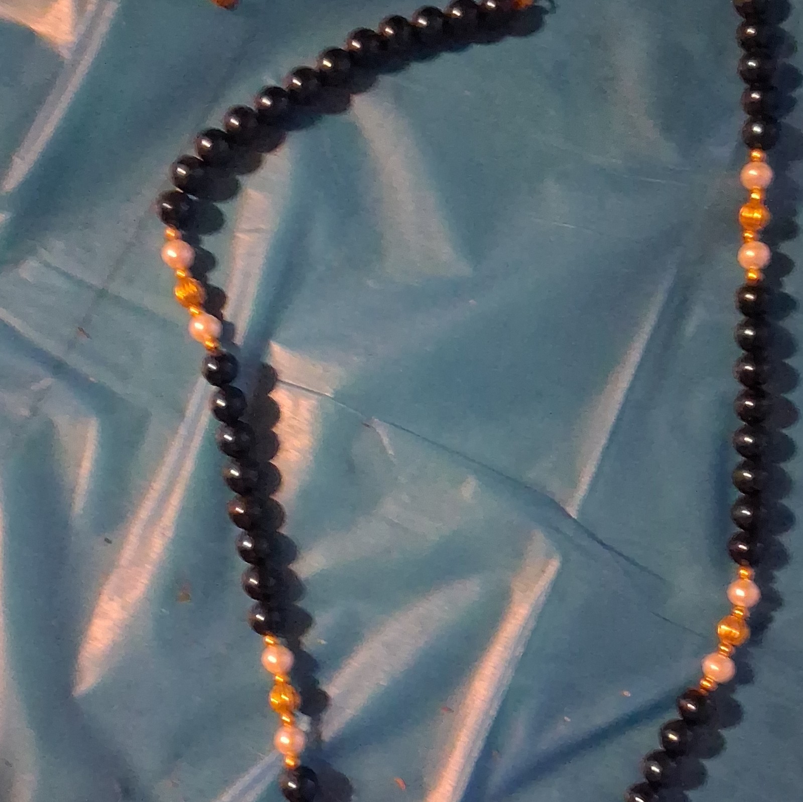 Black Beaded Necklace with Gold Tone Bead Accents, Spring Ring Clasp