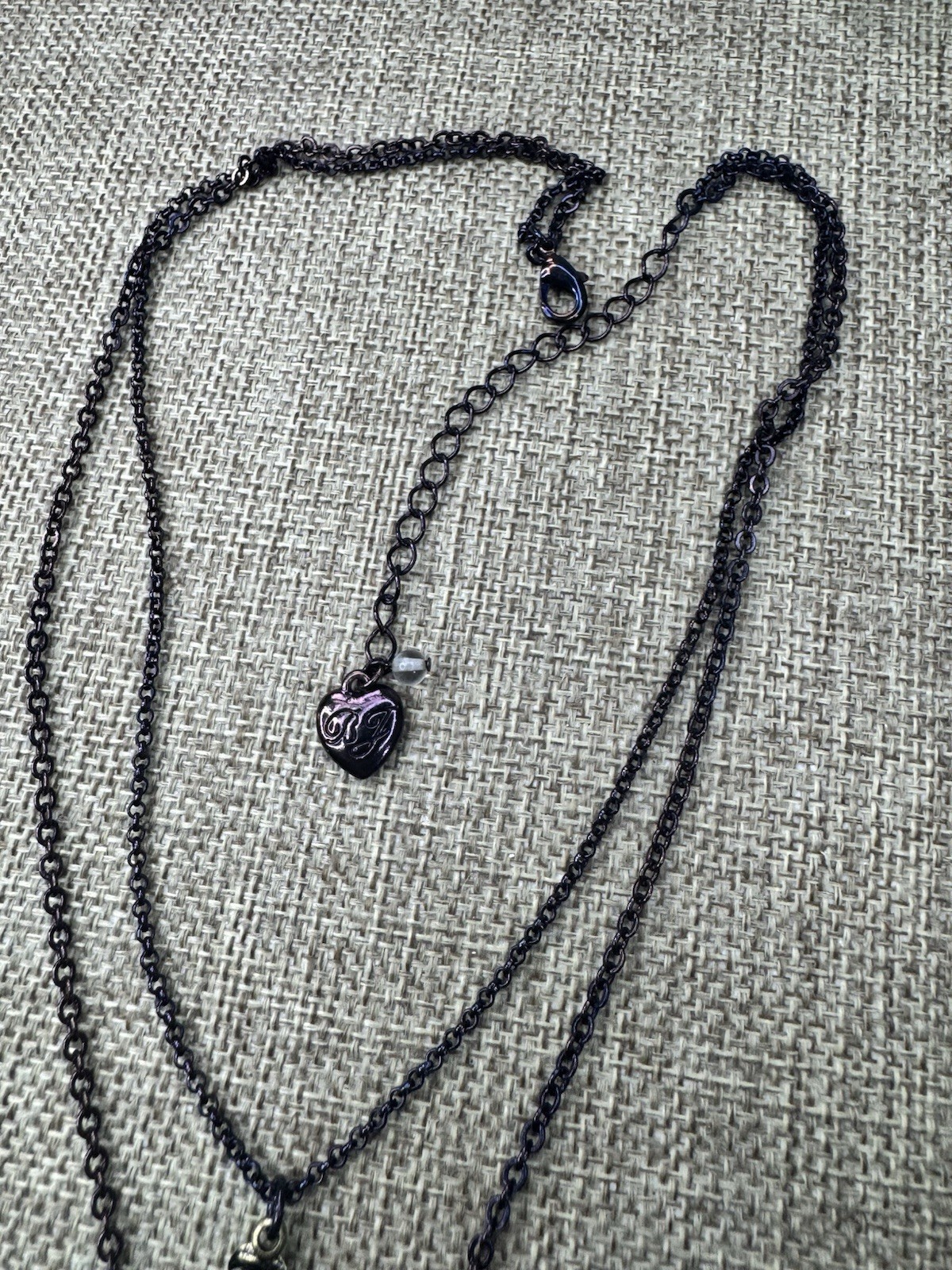 Betsey Johnson Layered Charm,purple/iridescent necklace 16”-19”