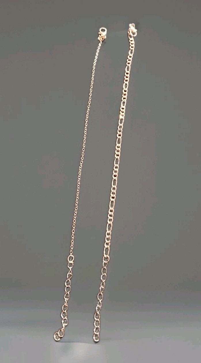 Set of 2 Anklets, Gold Tone Chains One Figaro And One Cable Type Chains.