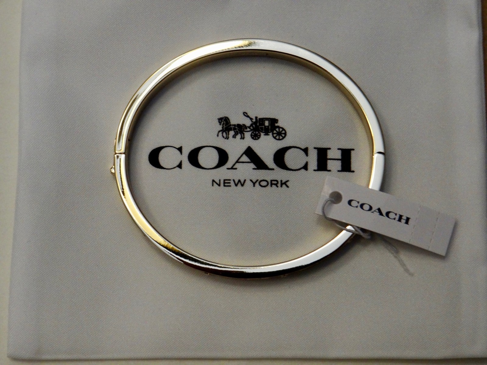 New! Coach Signature Hinged Bangel in Gold