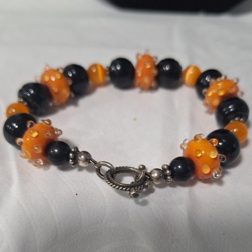 Black/Orange Glass Beaded Bracelet, Silver Tone Toggle Clasp, Dangle Charm