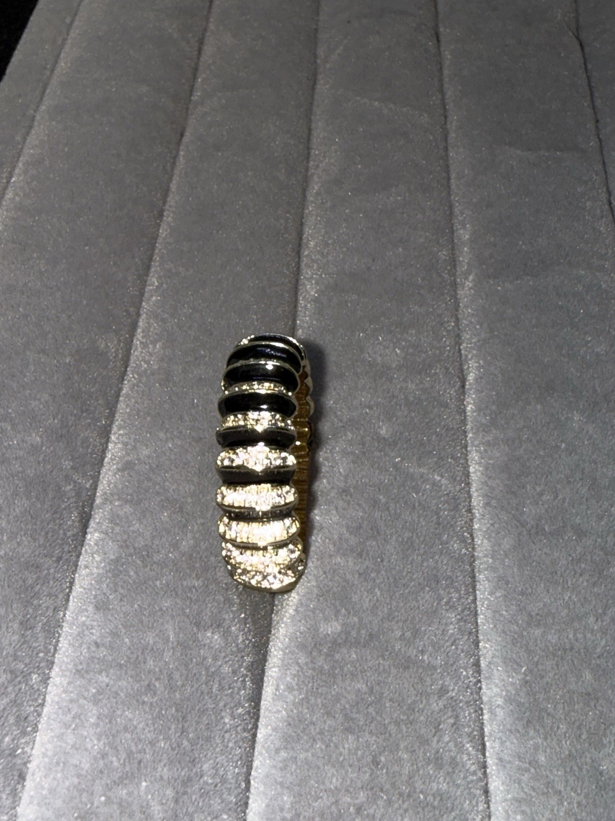 Sim. Diam. Eter. Ring In Goldtone. Blk. Enam. The Ring Is A Size 8. 1.10 Ctw