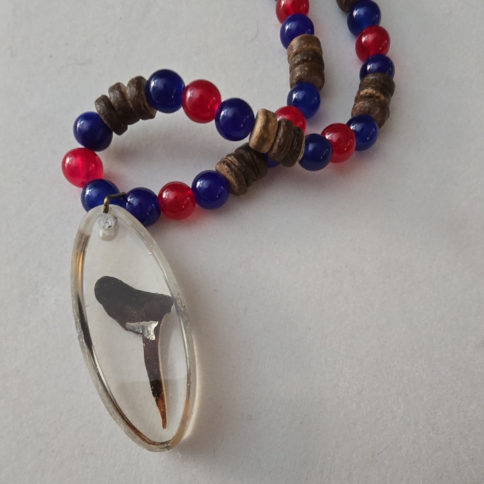 Shark Tooth Beaded Necklace, Clear Oval Charm Pendant, Red Blue Beads, Lobster
